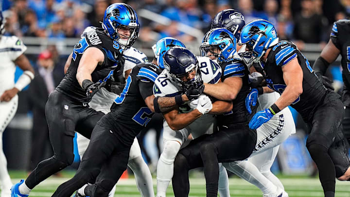 Detroit Lions defenders against Seattle Seahawks. Detroit Lions defenders against Seattle Seahawks.