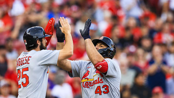Aug 29, 2025; Cincinnati, Ohio, USA; St. Louis Cardinals catcher Pedro Pages (43) high fives second baseman Thomas Saggese (25) after hitting a two-run home run in the second inning against the Cincinnati Reds at Great American Ball Park. Mandatory Credit: Katie Stratman-Imagn Images