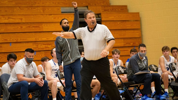 Barron Collier head coach David Watts yells to players during the first game of the Kelleher Law Holiday Hoopfest between Barron Collier High School and Lehigh Senior High School held at Golden Gate High School on Monday, December 28, 2020. Lehigh beat Barron Collier 58-49.

Ndn 1228 Ad Holiday Hoopfest 008
