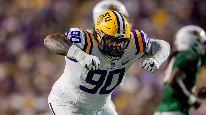 Sep 20, 2025; Baton Rouge, Louisiana, USA; LSU Tigers defensive tackle Jacobian Guillory II (90) reacts to causing a fumble against the Southeastern Louisiana Lions during the first half at Tiger Stadium. Mandatory Credit: Stephen Lew-Imagn Images Sep 20, 2025; Baton Rouge, Louisiana, USA; LSU Tigers defensive tackle Jacobian Guillory II (90) reacts to causing a fumble against the Southeastern Louisiana Lions during the first half at Tiger Stadium. Mandatory Credit: Stephen Lew-Imagn Images