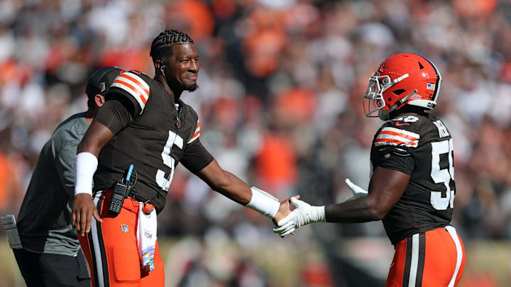 Cleveland Browns quarterback Jameis Winston (5) celebrates a touchdown with Cleveland Browns linebacker Winston Reid (59) during the first half of an NFL football game against the Cincinnati Bengals at Huntington Bank Field, Sunday, Oct. 20, 2024, in Cleveland, Ohio.