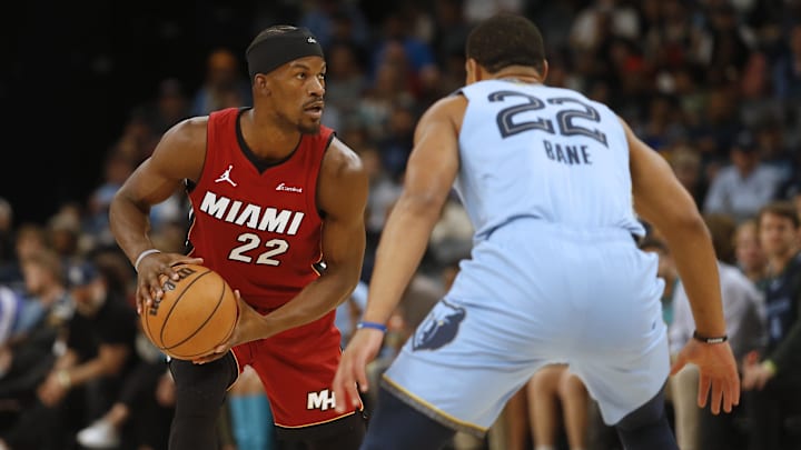 Nov 8, 2023; Memphis, Tennessee, USA; Miami Heat forward Jimmy Butler (22) handles the ball as Memphis Grizzlies guard Desmond Bane (22) defends during the first half at FedExForum. Mandatory Credit: Petre Thomas-Imagn Images Nov 8, 2023; Memphis, Tennessee, USA; Miami Heat forward Jimmy Butler (22) handles the ball as Memphis Grizzlies guard Desmond Bane (22) defends during the first half at FedExForum. Mandatory Credit: Petre Thomas-Imagn Images
