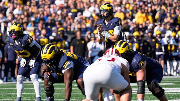 Michigan quarterback Tommy Carr (14) calls for a snap against Indiana during the second half at Michigan Stadium in Ann Arbor on Saturday, Oct. 24, 2026.