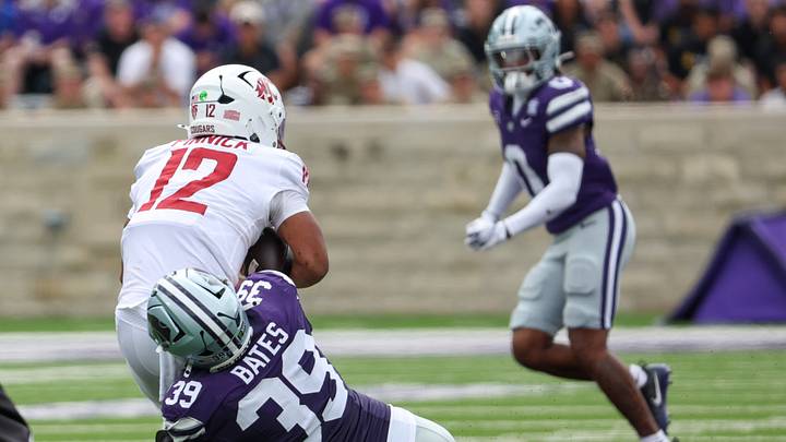 Sep 12, 2026; Manhattan, Kansas, USA; Kansas State Wildcats defensive end Travis Bates (39) sacks Washington State Cougars quarterback Caden Pinnick (12) during the second quarter at Bill Snyder Family Football Stadium. Mandatory Credit: Scott Sewell-Imagn Images Sep 12, 2026; Manhattan, Kansas, USA; Kansas State Wildcats defensive end Travis Bates (39) sacks Washington State Cougars quarterback Caden Pinnick (12) during the second quarter at Bill Snyder Family Football Stadium. Mandatory Credit: Scott Sewell-Imagn Images