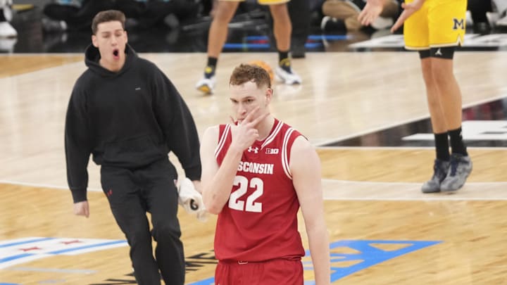 Mar 14, 2026; Chicago, IL, USA; Wisconsin Badgers forward Austin Rapp (22) reacts after making a three point basket against the Michigan Wolverines during the first half at United Center. Mandatory Credit: David Banks-Imagn Images Mar 14, 2026; Chicago, IL, USA; Wisconsin Badgers forward Austin Rapp (22) reacts after making a three point basket against the Michigan Wolverines during the first half at United Center. Mandatory Credit: David Banks-Imagn Images