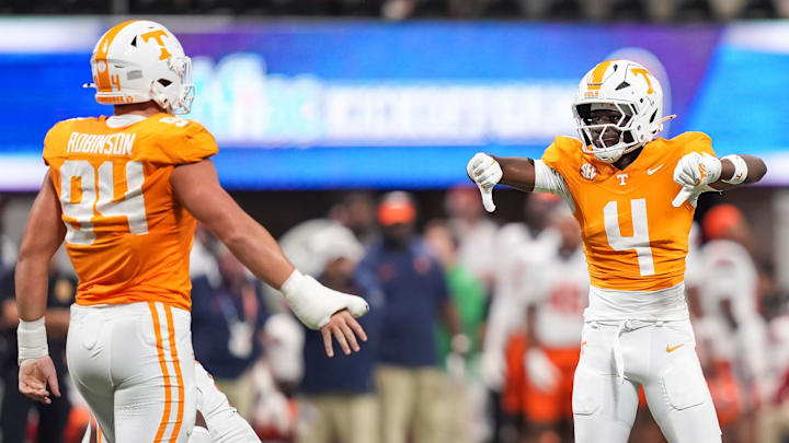 Tennessee defensive back Ty Redmond (4) celebrates after a defensive play during the Aflac Kickoff Game between the Volunteers and Syracuse held at Mercedes-Benz Stadium in Atlanta, Ga., on August 30, 2025. Tennessee defensive back Ty Redmond (4) celebrates after a defensive play during the Aflac Kickoff Game between the Volunteers and Syracuse held at Mercedes-Benz Stadium in Atlanta, Ga., on August 30, 2025.