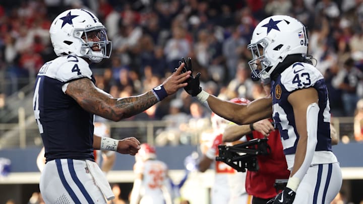 Dallas Cowboys quarterback Dak Prescott and running back Malik Davis celebrate after a touchdown against the Kansas City Chiefs