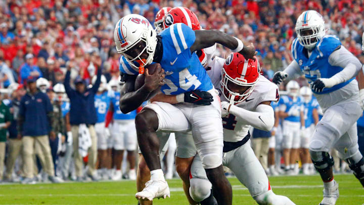 Nov 9, 2024; Oxford, Mississippi, USA; Mississippi Rebels running back Ulysses Bentley IV (24) runs the ball for a touchdown during the first half against the Georgia Bulldogs at Vaught-Hemingway Stadium. Mandatory Credit: Petre Thomas-Imagn Images