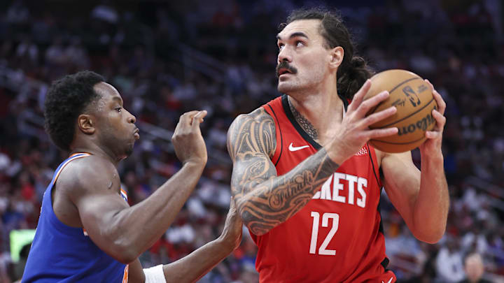 Nov 4, 2024; Houston, Texas, USA; New York Knicks forward OG Anunoby (8) defends against Houston Rockets center Alperen Sengun (28) during the first half at Toyota Center. Mandatory Credit: Troy Taormina-Imagn Images