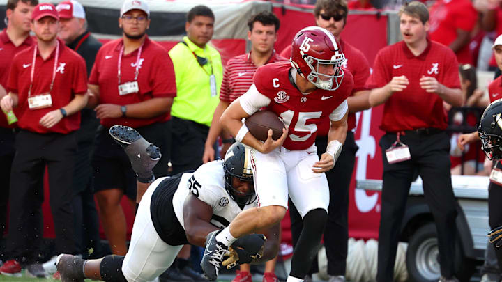 Oct 4, 2025; Tuscaloosa, Alabama, USA; Alabama Crimson Tide quarterback Ty Simpson (15) is tackled by Vanderbilt Commodores defensive lineman Aaron Bryant (55) during the second half at Saban Field at Bryant-Denny Stadium. Mandatory Credit: David Leong-Imagn Images Oct 4, 2025; Tuscaloosa, Alabama, USA; Alabama Crimson Tide quarterback Ty Simpson (15) is tackled by Vanderbilt Commodores defensive lineman Aaron Bryant (55) during the second half at Saban Field at Bryant-Denny Stadium. Mandatory Credit: David Leong-Imagn Images