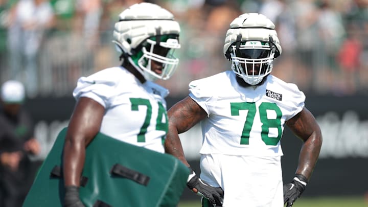Jul 27, 2024; Florham Park, NJ, USA; New York Jets offensive tackle Morgan Moses (78) looks on during drills during training camp at Atlantic Health Jets Training Center. 