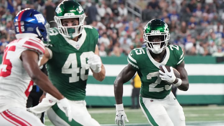 East Rutherford, NJ -- August 24, 2024 -- Israel Abanikanda of the Jets runs the ball in the first half. The New York Giants and New York Jets meet at MetLife Stadium in the final preseason game of the 2024 season for both teams.` East Rutherford, NJ -- August 24, 2024 -- Israel Abanikanda of the Jets runs the ball in the first half. The New York Giants and New York Jets meet at MetLife Stadium in the final preseason game of the 2024 season for both teams.`