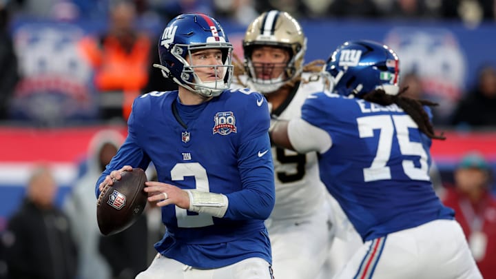 Dec 8, 2024; East Rutherford, New Jersey, USA; New York Giants quarterback Drew Lock (2) looks to pass against the New Orleans Saints during the fourth quarter at MetLife Stadium.  