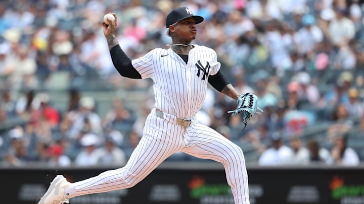 Jun 29, 2025; Bronx, New York, USA; New York Yankees pitcher Marcus Stroman (0) delivers a pitch during the first inning against the Athletics at Yankee Stadium. Mandatory Credit: Vincent Carchietta-Imagn Images
