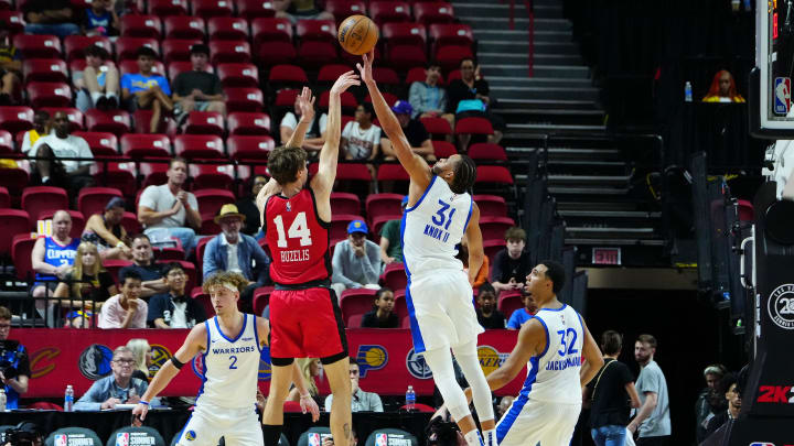 Jul 14, 2024; Las Vegas, NV, USA; Golden State Warriors forward Kevin Knox II (31) blocks a shot by Chicago Bulls forward Matas Buzelis (14) during the third quarter at Thomas & Mack Center. Mandatory Credit: Stephen R. Sylvanie-USA TODAY Sports