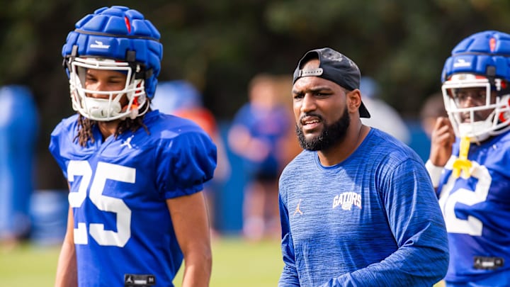 New Florida secondary coach Will Harris directs his defensive backs during the Florida Gators as they held their final open Spring football practice before the Orange and Blue Game at Sanders Practice Fields in Gainesville, FL on Tuesday, April 9, 2024. [Doug Engle/Gainesville Sun]