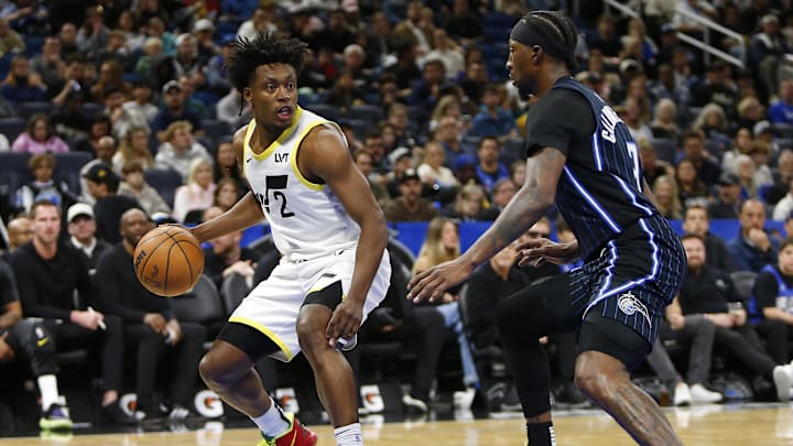 Utah Jazz guard Collin Sexton (2) drives to the basket while Orlando Magic guard Kentavious Caldwell-Pope (3) defends at Kia Center. Utah Jazz guard Collin Sexton (2) drives to the basket while Orlando Magic guard Kentavious Caldwell-Pope (3) defends at Kia Center.