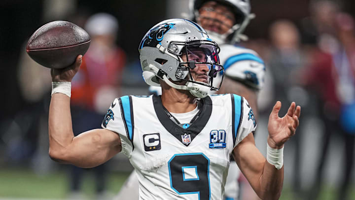 Jan 5, 2025; Atlanta, Georgia, USA; Carolina Panthers quarterback Bryce Young (9) passes on the run against the Atlanta Falcons during the second half at Mercedes-Benz Stadium. Mandatory Credit: Dale Zanine-Imagn Images