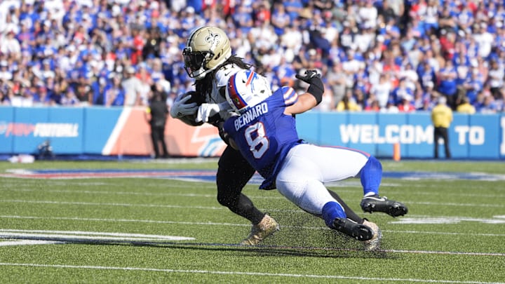 Sep 28, 2025; Orchard Park, New York, USA; New Orleans Saints running back Alvin Kamara (41) is tackled by Buffalo Bills linebacker Terrel Bernard (8) during the fourth quarter Sep 28, 2025; Orchard Park, New York, USA; New Orleans Saints running back Alvin Kamara (41) is tackled by Buffalo Bills linebacker Terrel Bernard (8) during the fourth quarter