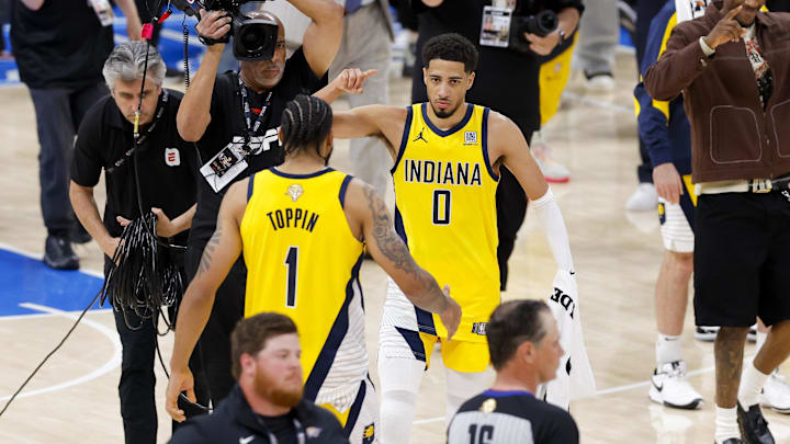 Indiana Pacers guard Haliburton and forward Toppin celebrate after the Pacers defeat the Oklahoma City Thunder during the 2025 NBA Finals at Paycom Center.