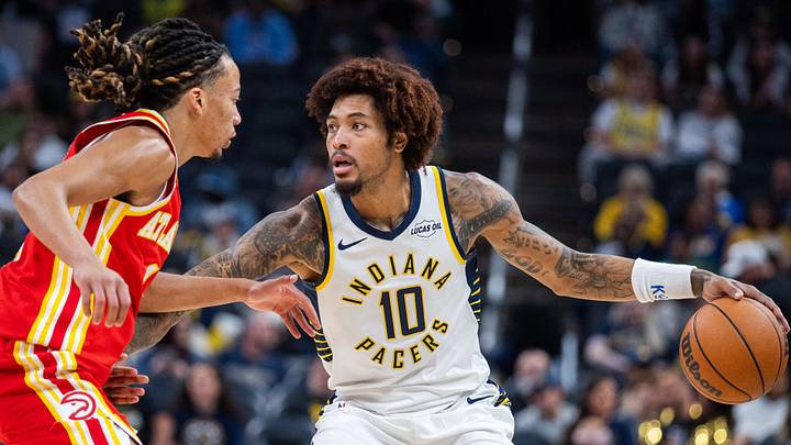 Oct 10, 2026; Indianapolis, Indiana, USA;  Indiana Pacers guard Kelly Oubre Jr. (10) dribbles the ball while Atlanta Hawks guard Kingston Flemings (4) defends in the first half at Gainbridge Fieldhouse.  Mandatory Credit: Trevor Ruszkowski-Imagn Images