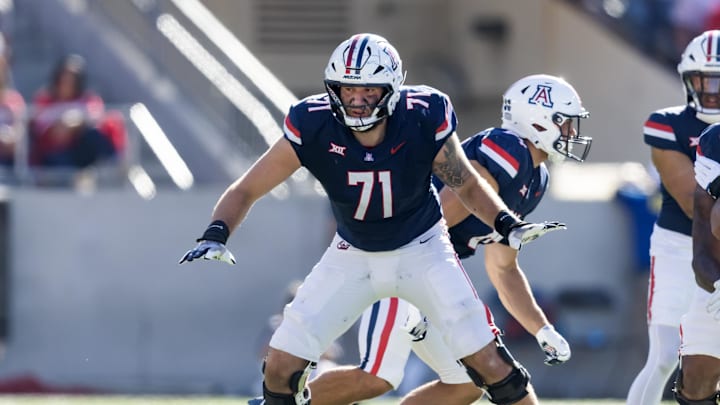 Nov 8, 2025; Tucson, Arizona, USA; Arizona Wildcats offensive lineman Tristan Bounds (71) against the Kansas Jayhawks at Arizona Stadium. Mandatory Credit: Mark J. Rebilas-Imagn Images