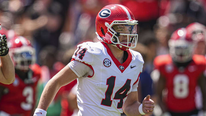 Apr 12, 2025; Athens, GA, USA; Georgia Bulldogs quarterback Gunner Stockton (14) runs on the field prior to the start of the Georgia Spring game at Sanford Stadium. Mandatory Credit: Dale Zanine-Imagn Images Apr 12, 2025; Athens, GA, USA; Georgia Bulldogs quarterback Gunner Stockton (14) runs on the field prior to the start of the Georgia Spring game at Sanford Stadium. Mandatory Credit: Dale Zanine-Imagn Images