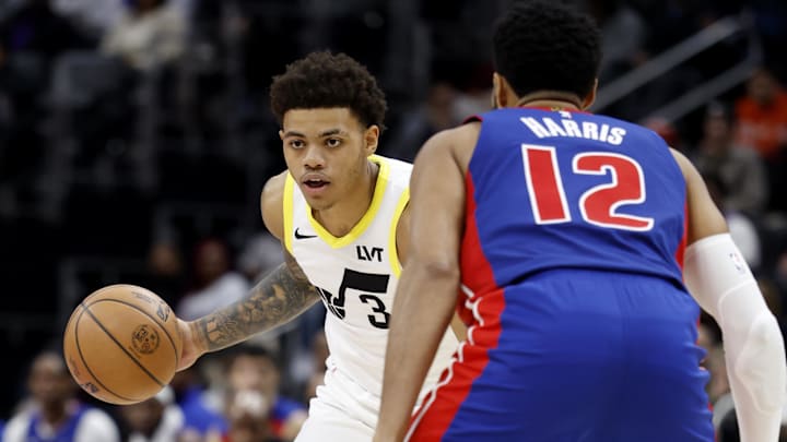 Dec 19, 2024; Detroit, Michigan, USA;  Utah Jazz guard Keyonte George (3) dribbles defended by Detroit Pistons forward Tobias Harris (12) in the third quarter at Little Caesars Arena. Mandatory Credit: Rick Osentoski-Imagn Images