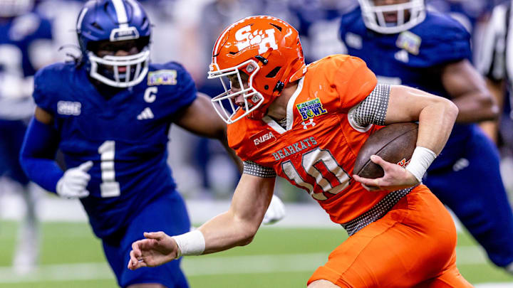Dec 19, 2024; New Orleans, LA, USA; Sam Houston State Bearkats quarterback Hunter Watson (10) scrambles against the Georgia Southern Eagles during the first half at Caesars Superdome. Mandatory Credit: Stephen Lew-Imagn Images Dec 19, 2024; New Orleans, LA, USA; Sam Houston State Bearkats quarterback Hunter Watson (10) scrambles against the Georgia Southern Eagles during the first half at Caesars Superdome. Mandatory Credit: Stephen Lew-Imagn Images