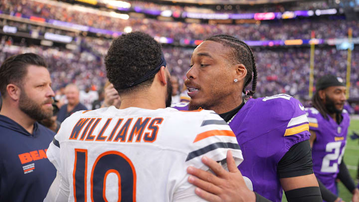 Nov 16, 2025; Minneapolis, Minnesota, USA; Chicago Bears quarterback Caleb Williams (18) greets Minnesota Vikings wide receiver Justin Jefferson (18) following a game at U.S. Bank Stadium. Mandatory Credit: Brad Rempel-Imagn Images