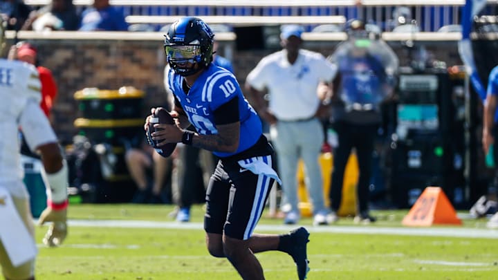 Oct 18, 2025; Durham, North Carolina, USA; Duke Blue Devils quarterback Darian Mensah (10) runs with the ball during the first half of the game against Georgia Tech Yellow Jackets at Wallace Wade Stadium. Mandatory Credit: Jaylynn Nash-Imagn Images Oct 18, 2025; Durham, North Carolina, USA; Duke Blue Devils quarterback Darian Mensah (10) runs with the ball during the first half of the game against Georgia Tech Yellow Jackets at Wallace Wade Stadium. Mandatory Credit: Jaylynn Nash-Imagn Images