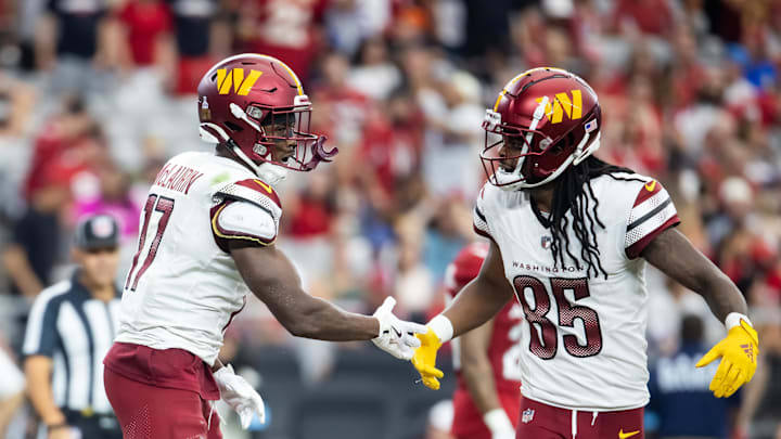 Sep 29, 2024; Glendale, Arizona, USA; Washington Commanders wide receiver Terry McLaurin (17) celebrates a touchdown with Noah Brown (85) against the Arizona Cardinals in the second half at State Farm Stadium. Mandatory Credit: Mark J. Rebilas-Imagn Images