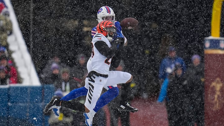 Cincinnati Bengals cornerback DJ Turner II (20) breaks up a pass to Buffalo Bills wife receiver Keon Coleman (0) in the second quarter of the NFL Week 14 game between the Buffalo Bills and the Cincinnati Bengals at Highmark Stadium in Orchard Park, N.Y., on Sunday, Dec. 7, 2025.