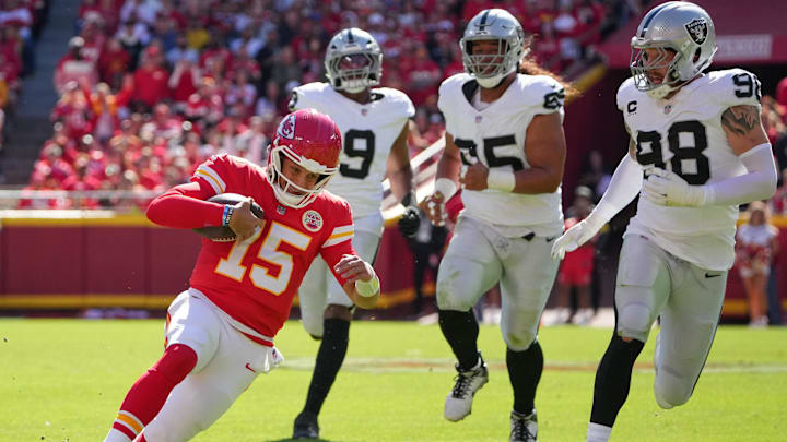 Oct 19, 2025; Kansas City, Missouri, USA; Kansas City Chiefs quarterback Patrick Mahomes (15) scrambles against the Las Vegas Raiders during the second quarter of the game at GEHA Field at Arrowhead Stadium. Mandatory Credit: Denny Medley-Imagn Images