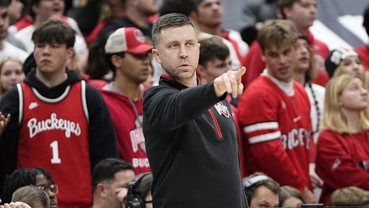 Ohio State Buckeyes head coach Jake Diebler motions during the second half of the NCAA men's basketball game against the Washington Huskies at Value City Arena in Columbus on Feb. 12, 2025. Ohio State won 93-69.
