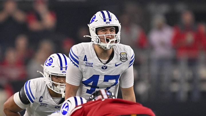 Dec 6, 2025; Arlington, TX, USA; BYU Cougars quarterback Bear Bachmeier (47) sets the play during the game between the Red Raiders and the Cougars at AT&T Stadium. Mandatory Credit: Jerome Miron-Imagn Images