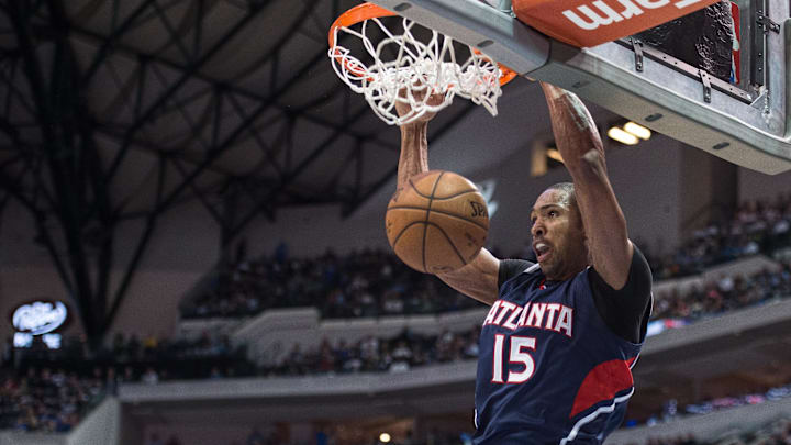 Dec 22, 2014; Dallas, TX, USA; Atlanta Hawks center Al Horford (15) dunks the ball against the Dallas Mavericks during the first half at the American Airlines Center. Mandatory Credit: Jerome Miron-Imagn Images