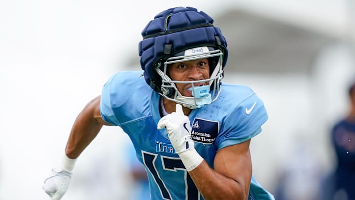 Tennessee Titans wide receiver Chimere Dike runs during an NFL football training camp practice. Tennessee Titans wide receiver Chimere Dike runs during an NFL football training camp practice.