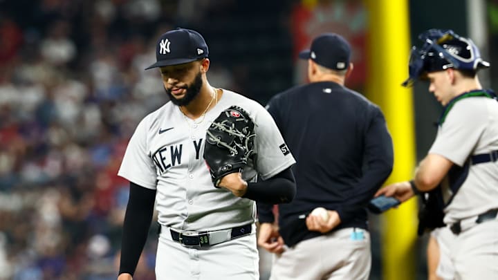 Aug 5, 2025; Arlington, Texas, USA;  New York Yankees relief pitcher Devin Williams (38) reacts after leaving the game during the eighth inning against the Texas Rangers at Globe Life Field. Mandatory Credit: Kevin Jairaj-Imagn Images