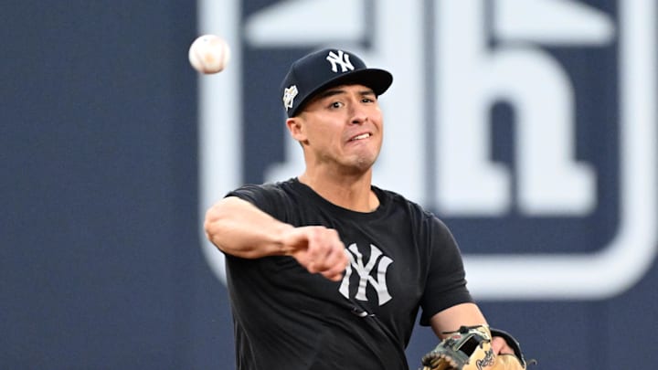 Oct 3, 2025; Toronto, Ontario, Canada;  New York Yankees shortstop Anthony Volpe (11) throws the ball during workouts at Rogers Centre. Mandatory Credit: Dan Hamilton-Imagn Images
