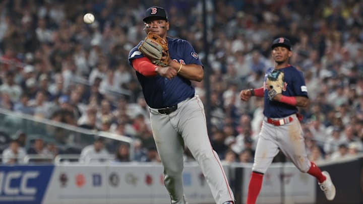 Jul 5, 2024; Bronx, New York, USA; Boston Red Sox third baseman Rafael Devers (11) throws the ball to first base for an out during the sixth inning against the New York Yankees at Yankee Stadium. Mandatory Credit: Vincent Carchietta-Imagn Images Jul 5, 2024; Bronx, New York, USA; Boston Red Sox third baseman Rafael Devers (11) throws the ball to first base for an out during the sixth inning against the New York Yankees at Yankee Stadium. Mandatory Credit: Vincent Carchietta-Imagn Images