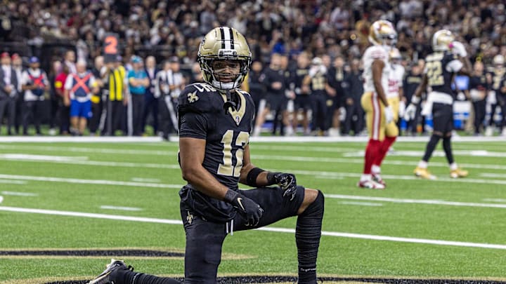 Sep 14, 2025; New Orleans, Louisiana, USA; New Orleans Saints wide receiver Chris Olave (12) reacts to dropping a pass in the end zone against the San Francisco 49ers during the first half at Caesars Superdome. Mandatory Credit: Stephen Lew-Imagn Images Sep 14, 2025; New Orleans, Louisiana, USA; New Orleans Saints wide receiver Chris Olave (12) reacts to dropping a pass in the end zone against the San Francisco 49ers during the first half at Caesars Superdome. Mandatory Credit: Stephen Lew-Imagn Images