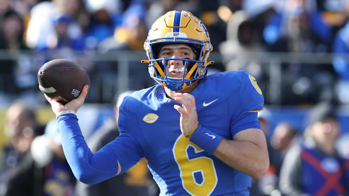 Nov 29, 2025; Pittsburgh, Pennsylvania, USA;  Pittsburgh Panthers quarterback Mason Heintschel (6) passes against the Miami Hurricanes during the first quarter at Acrisure Stadium. Mandatory Credit: Charles LeClaire-Imagn Images