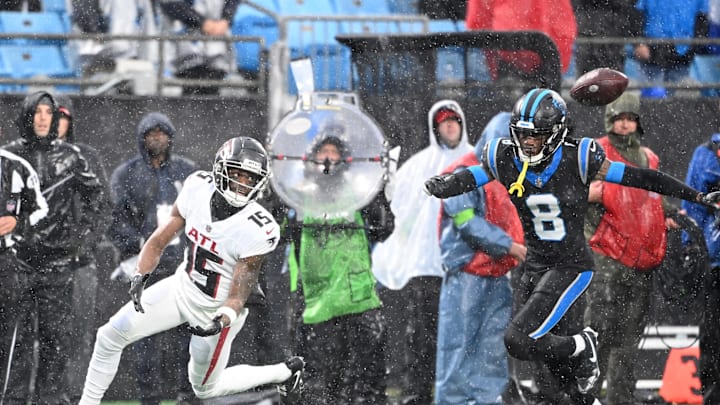 Dec 17, 2023; Charlotte, North Carolina, USA;  DUPLICATE***Atlanta Falcons tight end Feleipe Franks (15)***Atlanta Falcons wide receiver Van Jefferson (15) attempts to catch the ball as Carolina Panthers cornerback Jaycee Horn (8) defends in the second quarter at Bank of America Stadium. Mandatory Credit: Bob Donnan-Imagn Images