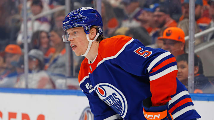 Mar 6, 2026; Edmonton, Alberta, CAN; Edmonton Oilers defensemen Connor Murphy (5) looks to make a pass against the Carolina Hurricanes at Rogers Place. Mandatory Credit: Perry Nelson-Imagn Images