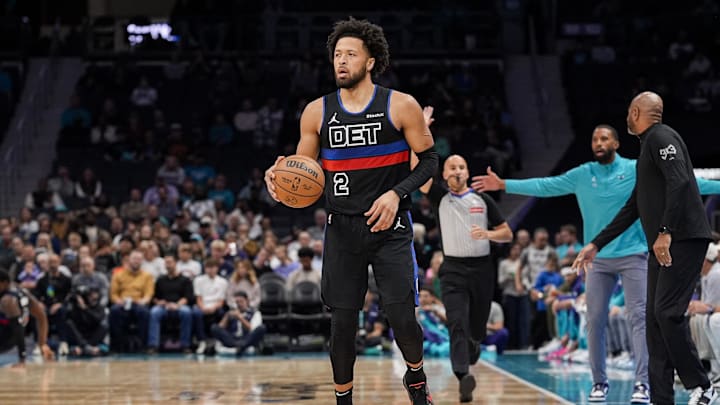 Nov 6, 2024; Charlotte, North Carolina, USA; Detroit Pistons guard Cade Cunningham (2) brings the ball up court against the Charlotte Hornets  during the first quarter at Spectrum Center. Mandatory Credit: Jim Dedmon-Imagn Images