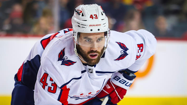 Mar 18, 2024; Calgary, Alberta, CAN; Washington Capitals right wing Tom Wilson (43) during the face off against the Calgary Flames during the first period at Scotiabank Saddledome. Mandatory Credit: Sergei Belski-Imagn Images