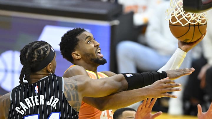 Jan 26, 2026; Cleveland, Ohio, USA; Orlando Magic center Wendell Carter Jr. (34) defends a shot by Cleveland Cavaliers guard Donovan Mitchell (45) in the fourth quarter at Rocket Arena. Mandatory Credit: David Richard-Imagn Images Jan 26, 2026; Cleveland, Ohio, USA; Orlando Magic center Wendell Carter Jr. (34) defends a shot by Cleveland Cavaliers guard Donovan Mitchell (45) in the fourth quarter at Rocket Arena. Mandatory Credit: David Richard-Imagn Images