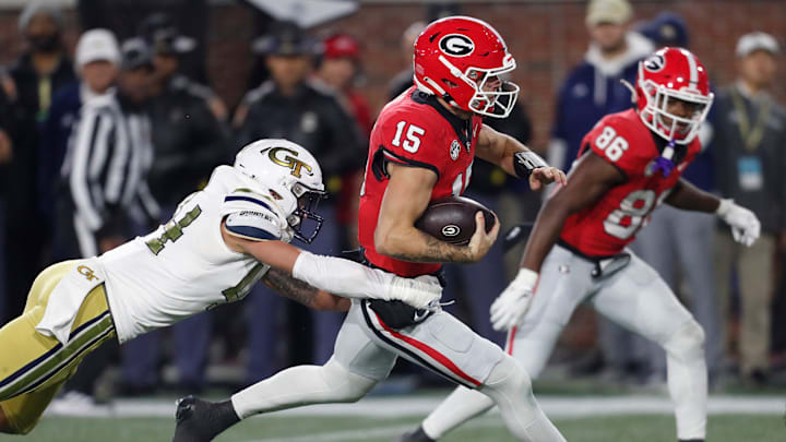 Georgia quarterback Carson Beck (15) runs the ball during the second half of a NCAA college football game against Georgia Tech in Atlanta, on Saturday, Nov. 25, 2023.Georgia won 31-23. Georgia quarterback Carson Beck (15) runs the ball during the second half of a NCAA college football game against Georgia Tech in Atlanta, on Saturday, Nov. 25, 2023.Georgia won 31-23.
