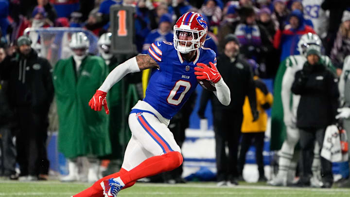 Jan 4, 2026; Orchard Park, New York, USA; Buffalo Bills wide receiver Keon Coleman (0) carries the ball against the New York Jets during the third quarter at Highmark Stadium.